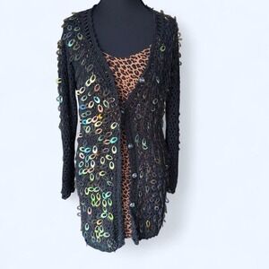 crochet cardigan featuring all-over black beading and iridescent sequin